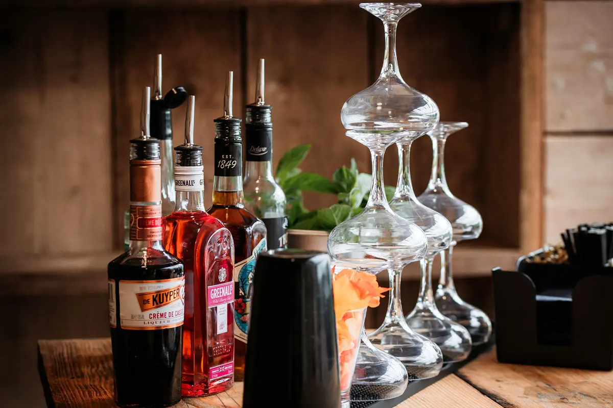 Interactive cocktail experience by Frisky Pheasant at a Tree Top Escape wedding