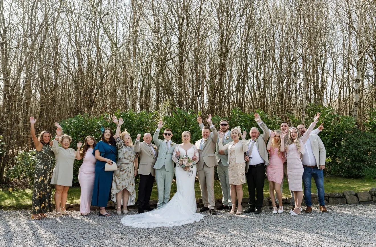 Kelly and Ryan celebrating with their family and friends at Tree Top Escape